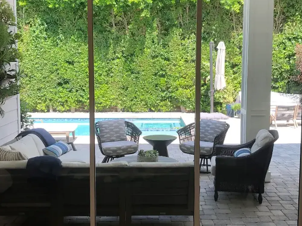 Residential sliders treated with film, the garden view completely unchanged.